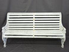 WOODEN SLATTED GARDEN BENCH with cast iron ends, 79cms height, 160cms width, 74cms depth