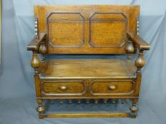 GOOD CARVED OAK MONKS' BENCH with baluster supports and shaped lower apron, 78cms height, 107cms