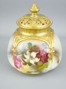 ROYAL WORCESTER - a glazed circular bowl of slightly tapered form with gilt neck and pierced and