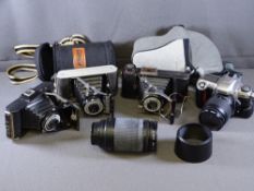 NIKON FC5 CAMERA with a Nikon AF Nikkor zoom lense and three period cameras