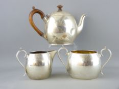 SILVER TEA SERVICE - three pieces of plain bulbous form by W E Hill and Co, 27ozs gross, London