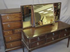 STAG BEDROOM CHEST of seven drawers, 111.5cms H, 81cms W, 43cms D and matching triple mirror