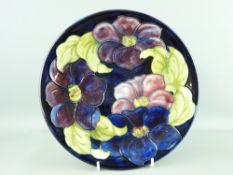 MOORCROFT ANEMONE PLATE, deep blue ground, 26cms diameter with original Queen Mary label to the