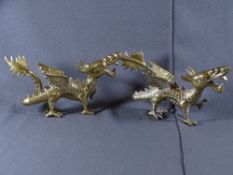 BRASS DRAGON FIGURES, A PAIR, 27cms L