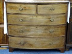 GEORGIAN MAHOGANY BOW FRONT CHEST of two short over three long drawers on bracket corner feet,
