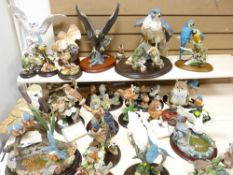 COUNTRY ARTISTS, ROYAL DOULTON, LEONARDO & OTHERS - assorted bird sculptures, many on plinths with