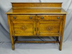 RAIL BACK EDWARDIAN SIDEBOARD two drawers over two cupboard doors with 'Arts and Crafts' style
