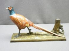 METALLIC SCULPTURE of a pheasant on a plinth inscribed 'United Dairy Men Condensed Milk Company