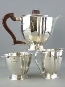 SILVER TEA SERVICE - three pieces of oblong form with shallow pedestals and the body of each with