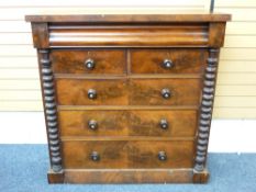 VICTORIAN MAHOGANY CHEST of two short over three long drawers, having turned wooden knobs with