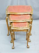 GOOD SET OF THREE REPRODUCTION CARVED WALNUT SIDE TABLES with gilt tooled leather inserts and