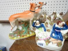 STAFFORDSHIRE GREYHOUNDS - a pair and a Staffordshire spill holder