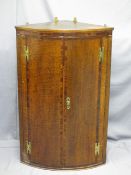 ANTIQUE BOW FRONTED WALL HANGING CORNER CUPBOARD