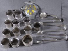 SILVER & OTHER NAPKIN RINGS, tongs, an AA badge and an AA car motif ETC