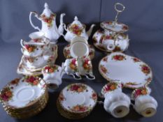 ROYAL ALBERT COUNTRY ROSES TEAWARE including cake stand, approximately fifty pieces