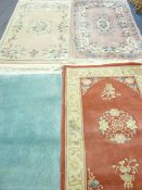 THREE CHINESE WASH WOOL RUGS and one other, various measurements