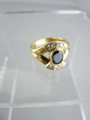 18CT GOLD DIAMOND & SAPPHIRE RING, SIZE N, 5.8grms the central oval sapphire and six diamonds set in