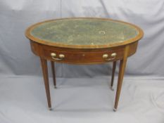 EDWARDIAN STRING INLAID MAHOGANY OVAL LADY'S DESK with inset writing surface, single frieze drawer
