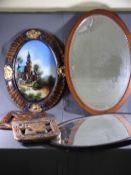 PAINTING ON GLASS of church with figures to foreground, two carved African panels and two oval