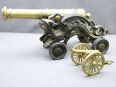 GLASS & IRON MODEL CANNON and another smaller