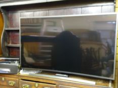 SAMSUNG SMART CURVED TV 55in model No VE55JS8500 and a Panasonic blue ray player E/T