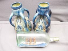 PAIR OF GREEN & BLUE GLAZED QUADRUPLE HANDLED TAPERED VASES with narrow necks, 27cms H and a three