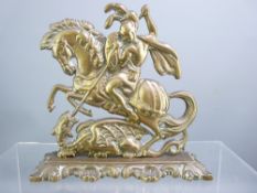 BRASS DOORSTOP - Horseman slaying a dragon on an oblong base with scroll decoration