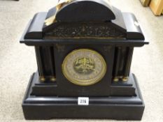 SLATE MANTEL CLOCK with flanking twin pillars either side of exposed movement, 39cms H x 39cms W