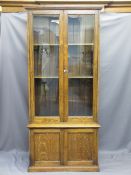 VINTAGE OAK BOOKCASE CUPBOARD with twin upper glazed doors and panelled base doors, 202cms H,