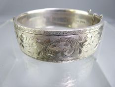 SILVER BANGLE with chased half decoration, London 1963, 2 troy ozs