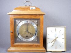 ELLIOTT OF LONDON walnut effect glass face mantel clock and a Swiza retro mantel clock