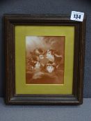 AFTER SIR JOSHUA REYNOLDS, framed porcelain plaque depicting cherubic heads among the clouds, 12.5 x