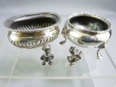 CIRCULAR SILVER SALT ON THREE PAD FEET, 1.7ozs, marks indistinct, an oval silver salt, 1.3ozs,