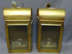 ANTIQUE STYLE COPPER PARAFFIN LAMPS, a pair, with bevel edged glass, 42cms H