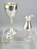 THREE SMALL SILVER ITEMS including a three footed cream jug, Sheffield 1907, a pair of sugar tongs