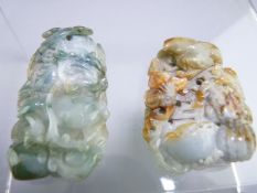 CARVED JADE PENDANTS x 2, one depicting a rabbit amongst vegetables, 5cms and one depicting a