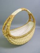 ROYAL WORCESTER - substantial boat shaped woven basket with single split-end handle, 1906, 25cms