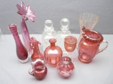CRANBERRY GLASSWARE - an assortment and two square based glass decanters with stoppers ETC