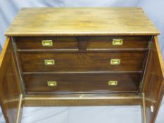 CIRCA 1900 CAMPAIGN STYLE SIDEBOARD of two opening panel doors before an interior arrangement of two