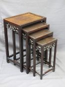 QUARTETTO OF CARVED CHINESE HARDWOOD SIDE TABLES, 66cms H, 44.5cms W, 33.5cms D