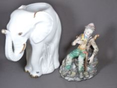 CAPODIMONTE TYPE FIGURE and a porcelain elephant stick stand