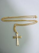 A PRESUMED GOLD CROSS ON AN 18CT GOLD CHAIN, 6.9grms gross