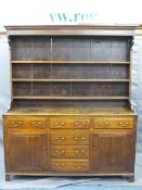 NORTH WALES OAK DRESSER CIRCA 1820, canopy three shelf rack with wide back boards and shaped side
