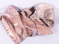 LEATHER GATORS and an old leather, fur lined pilot's hat labelled 'Ledux'