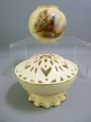 ROYAL WORCESTER - a small blush bowl with two painted pheasants in a landscape, signed by James