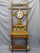 CIRCA 1900 OAK MIRRORED HALL STAND with brass hooks and side rails, single central drawer and