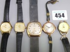 TWO 9CT GOLD CASED VINTAGE WRIST WATCHES and three others including a Tissot Antimagnetique