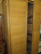 ULTRA MODERN LIGHT WOOD KITCHEN STORAGE UNIT with slide-out chrome racking and interior shelving,