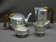 FOUR PIECE PIQUOT TEASET