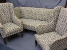 VINTAGE HARLEQUIN THREE PIECE SUITE of Chesterfield type couch and two wing-back armchairs,